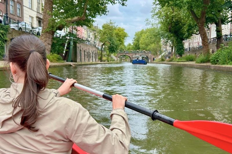 female student in a canoe